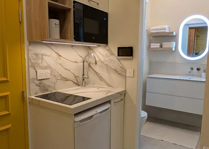 - Rooftop Views, Wine Cellar & Espresso *